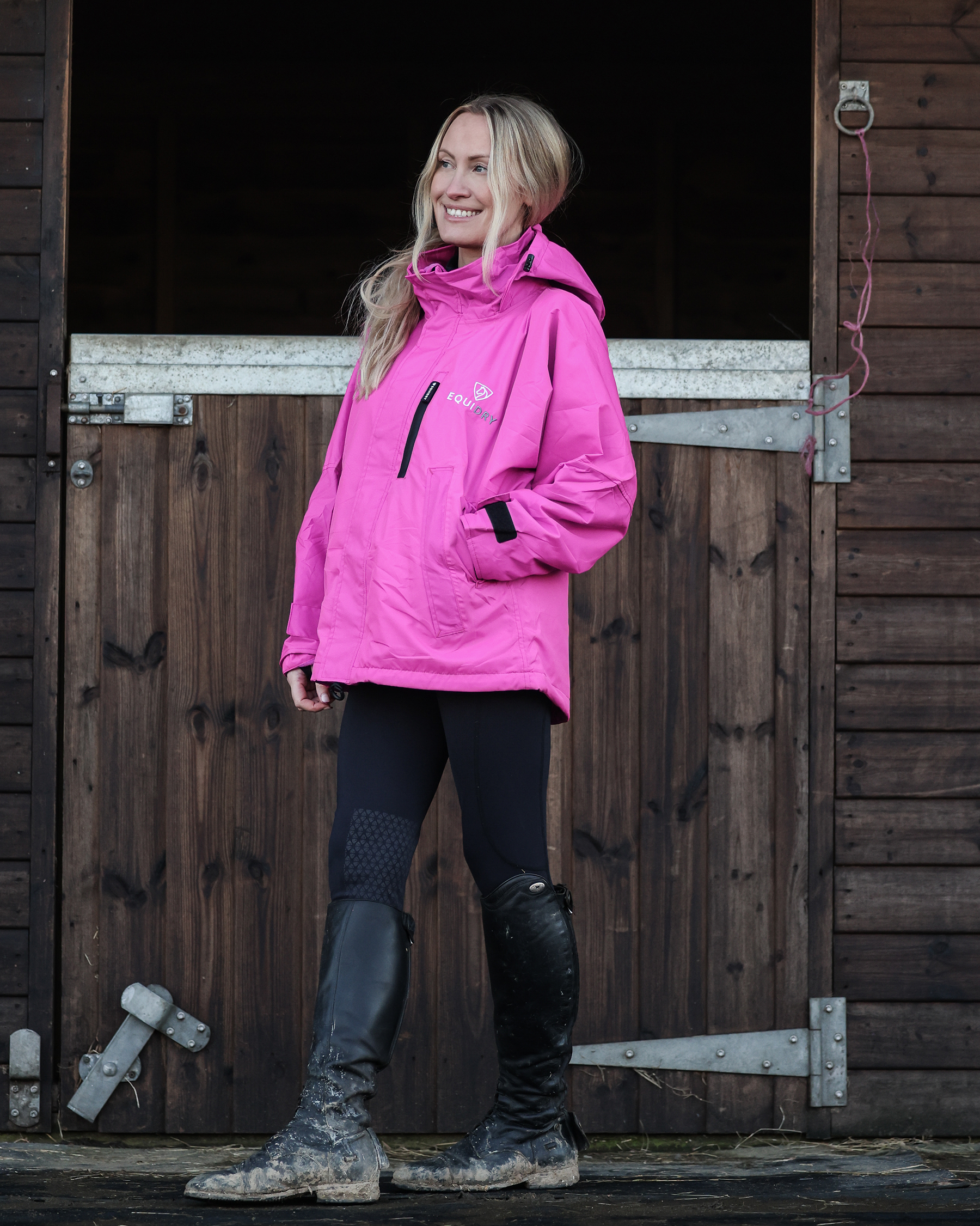 Woman in Pink EQUIDRY Waterproof Jacket Riding Outfit Outdoor Barn Equestrian Fashion